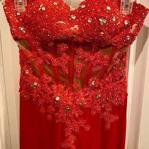 Elegant Red Lace Gown with Floral Embellishments